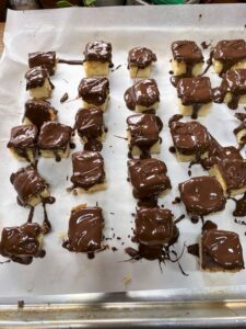 Thick chocolate coating refusing to cooperate during Kandy Kakes recreation
