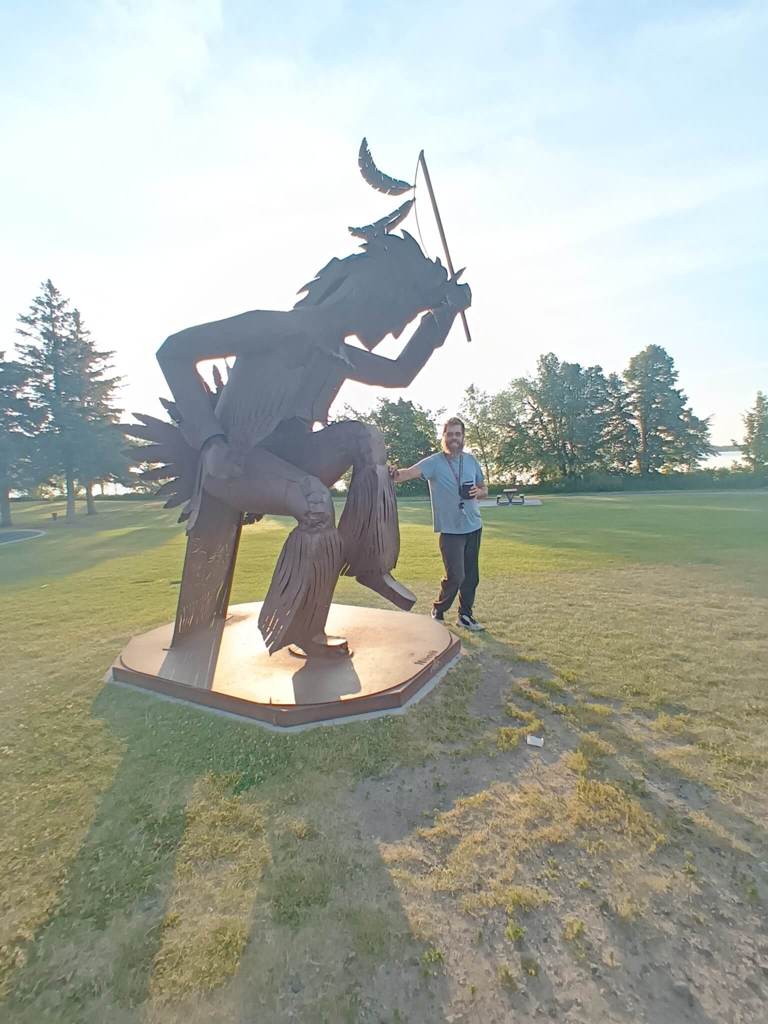 Things to do in Minnesota - Nancy at Native American statue in Bemidji