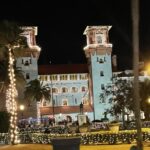 Things To Do In Florida - image of the Lightner Museum in St Augustine Florida, lit up for the Nights of Lights celebration.