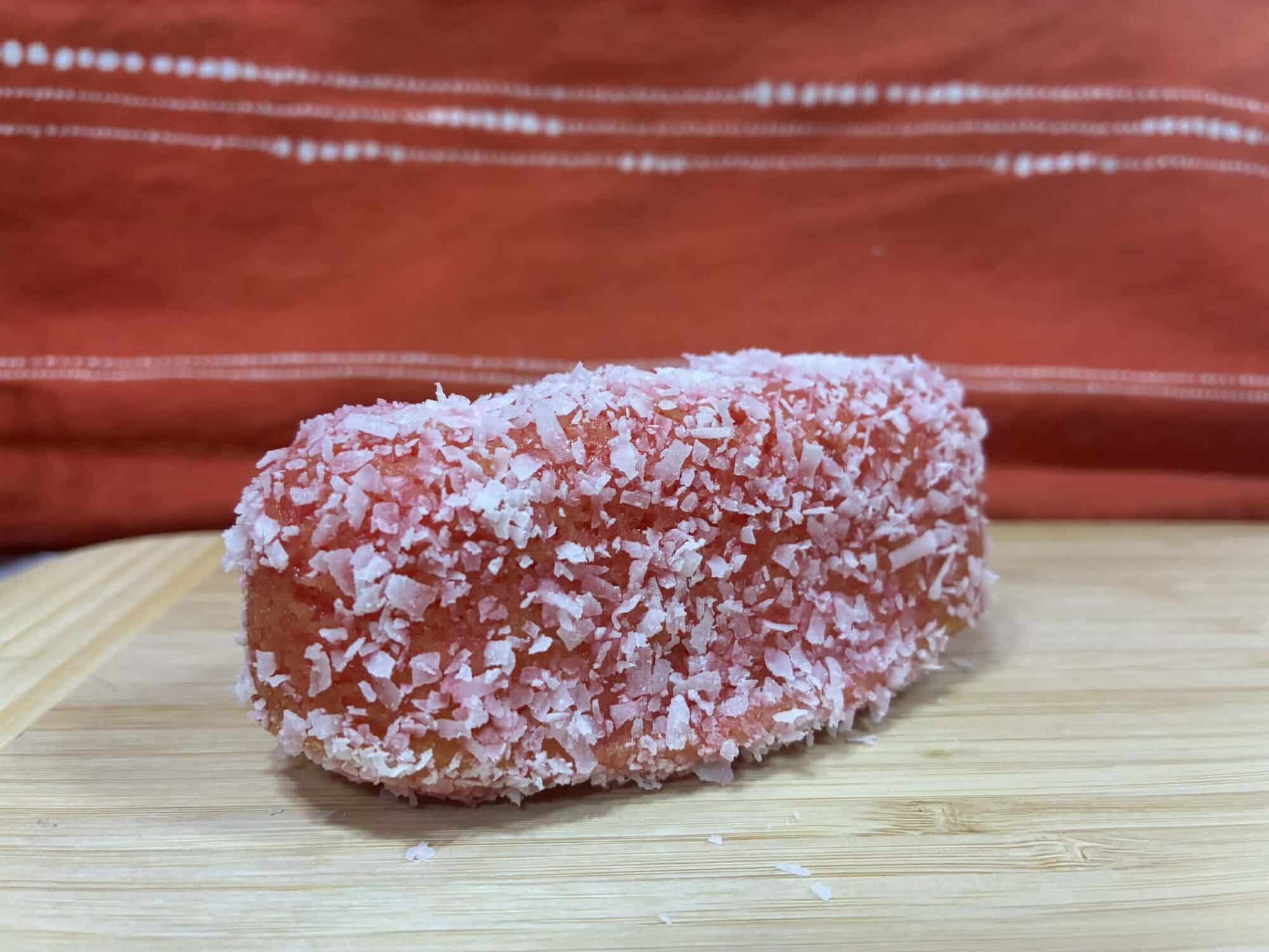 Homemade raspberry Zingers coated in pink coconut