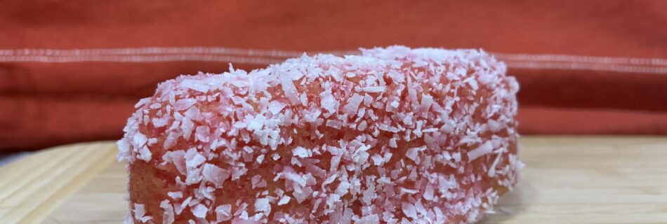 Homemade raspberry Zingers coated in pink coconut