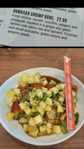 Hawaiian shrimp bowl with pineapple, vegetables, and sticky rice at Salt Life Food Shack in St. Augustine