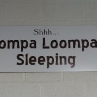 Oompa Loompa Sleeping sign inside chocolate factory tour during our road trip