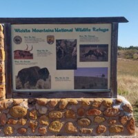 Wichita Mountains National Wildlife Refuge informational sign at Mount Scott Oklahoma entrance