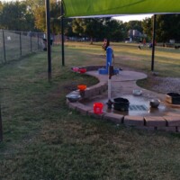 Covered water station for dogs at Benjamin's Biscuit Acres Dog Park Tulsa