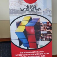 Banner from the 1982 World’s Fair highlighting the world’s largest Rubik’s Cube, originally housed in the Hungarian Pavilion and now living at the Knoxville Convention Center.