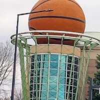 Knoxville’s giant basketball sculpture features detailed black ribbing and a textured surface, making it resemble a real basketball.
