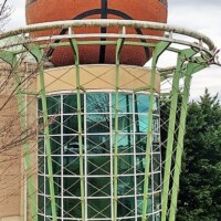 The World's Largest Basketball sculpture in Knoxville, Tennessee, designed as part of a building with a hoop-inspired framework