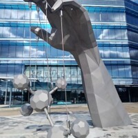 Hand holding molecules sculpture at Eastman Chemical headquarters Johnson City