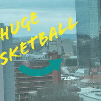 Roadside attraction: The massive basketball atop a sports-themed building, highlighted by an arrow in the image
