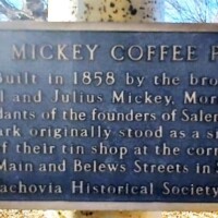 Historical plaque for The Mickey Coffee Pot, built in 1858 by Samuel and Julius Mickey as a tin shop sign in Salem.