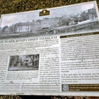 Historical marker discussing the Plank Road’s role in Salem’s trade, placed near The Mickey Coffee Pot landmark