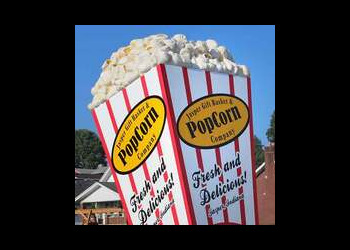 Giant popcorn sculpture at Jasper Gift Basket and Popcorn Company in Indiana - oversized roadside attraction