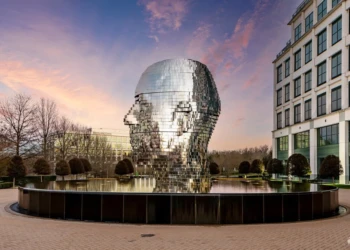 Metalmorphosis moving mirrored head sculpture in Charlotte North Carolina - 2026 road trip bucket list