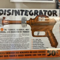 Vintage Daisy “Disintegrator” Buck Rogers ray gun advertisement displayed at the Daisy Airgun Museum in Rogers, Arkansas.