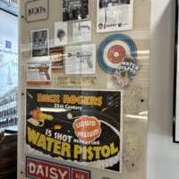 1930s Daisy Air Rifles and Buck Rogers themed advertisements and product displays at the Daisy Airgun Museum in Rogers, Arkansas.