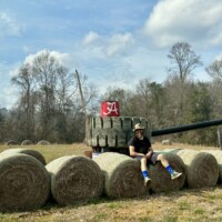 tank sculpture with hay bales at Jim Bird's Hay Bale Art in Forkland Alabama
