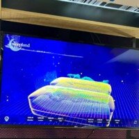 BedMatch diagnostic screen showing a colorful pressure-point heat map overlaid on a 3D rendering of a body lying on the sensor bed.