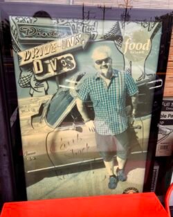 Diners, Drive-Ins and Dives display inside Carib Shack featuring Guy Fieri.
