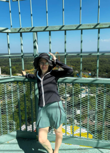 Nancy in the wind on the Kings Dominion Eiffel Tower observation deck