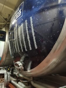 Close-up of a large stainless steel aging tank branded Bud Light Legends inside the Anheuser-Busch Beechwood Aging Cellars.